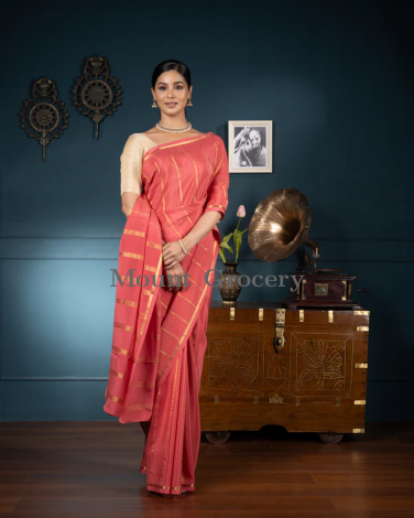 Peachish Pink Crepe Silk Saree